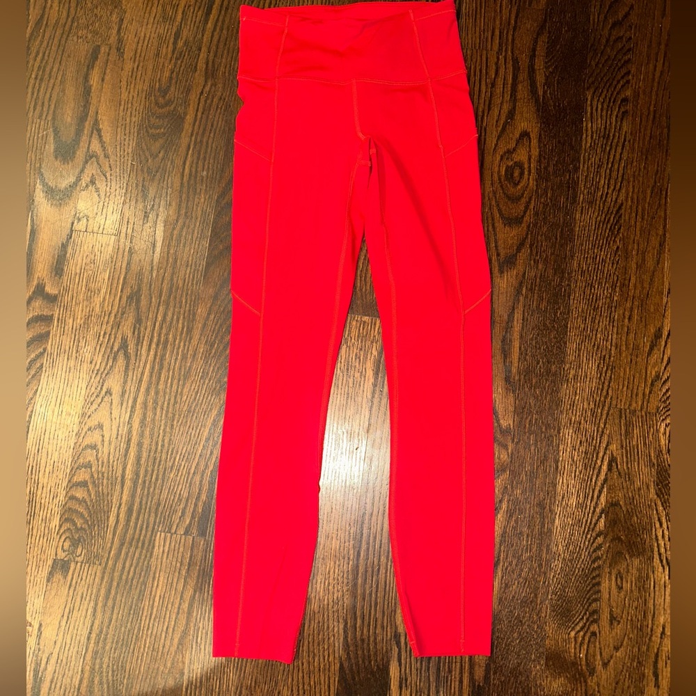 Lululemon big apple red leggings with side pocket size 4